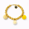Collar Pompones en lava dorada - Talla XXS